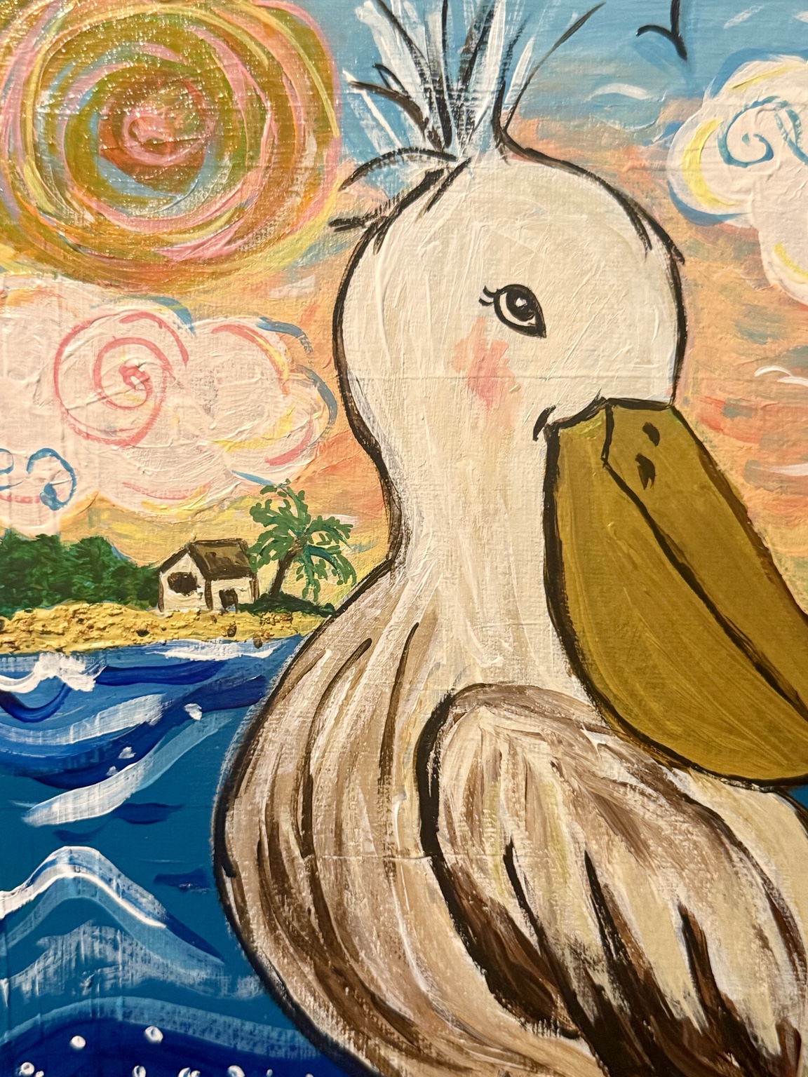 Close-up of the pelican and swirling sunset sky