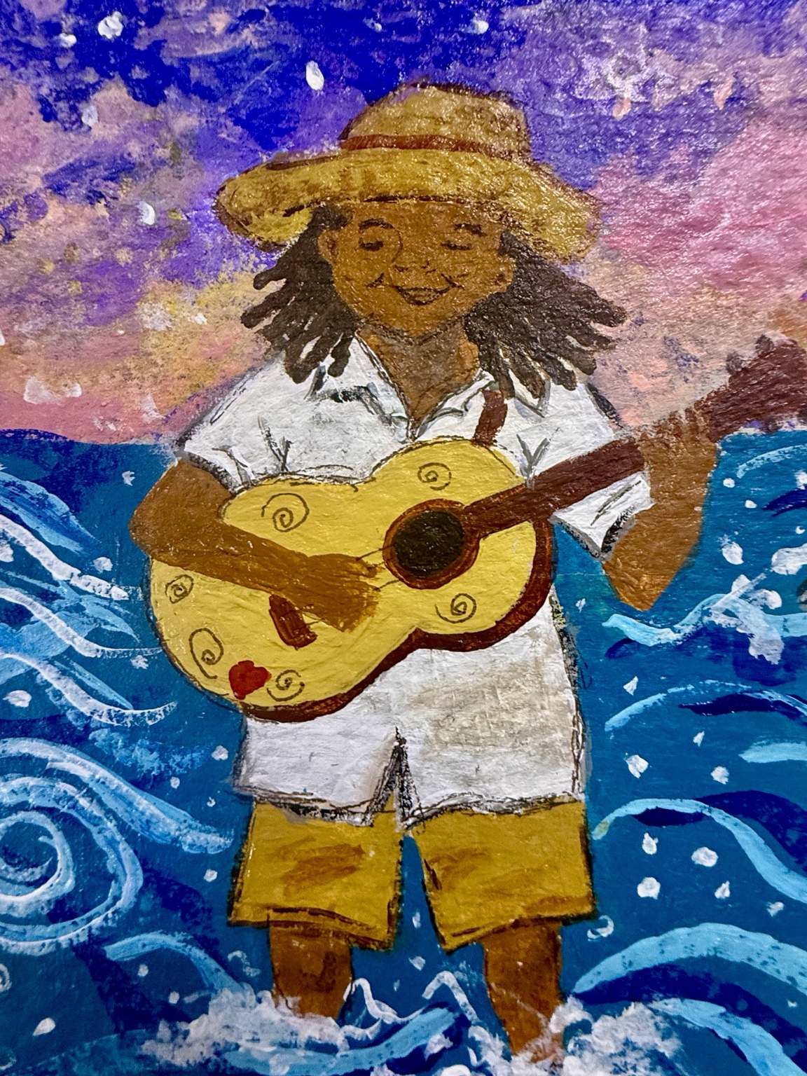 Close-up of the guitarist in the water