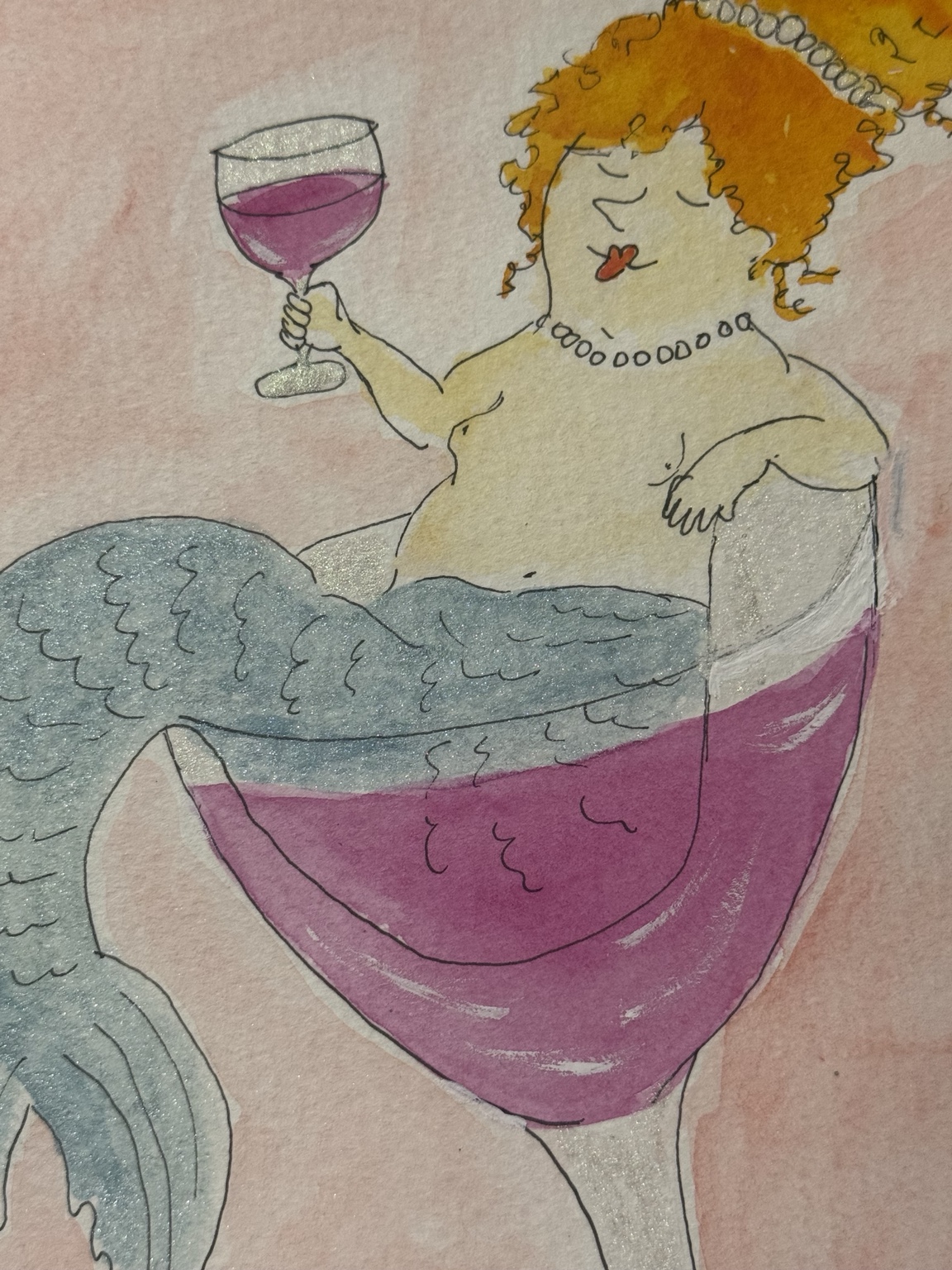 Close-up of Mabel in the wine glass