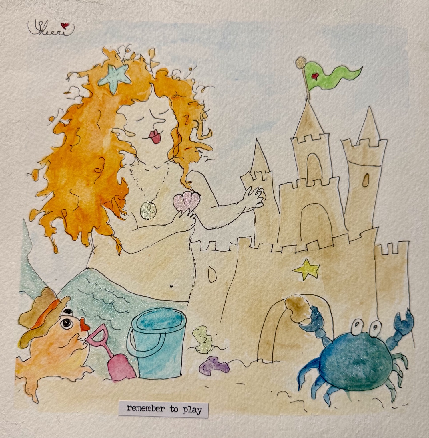 Mabel the mermaid builds a sandcastle with beach friends and a remember to play caption