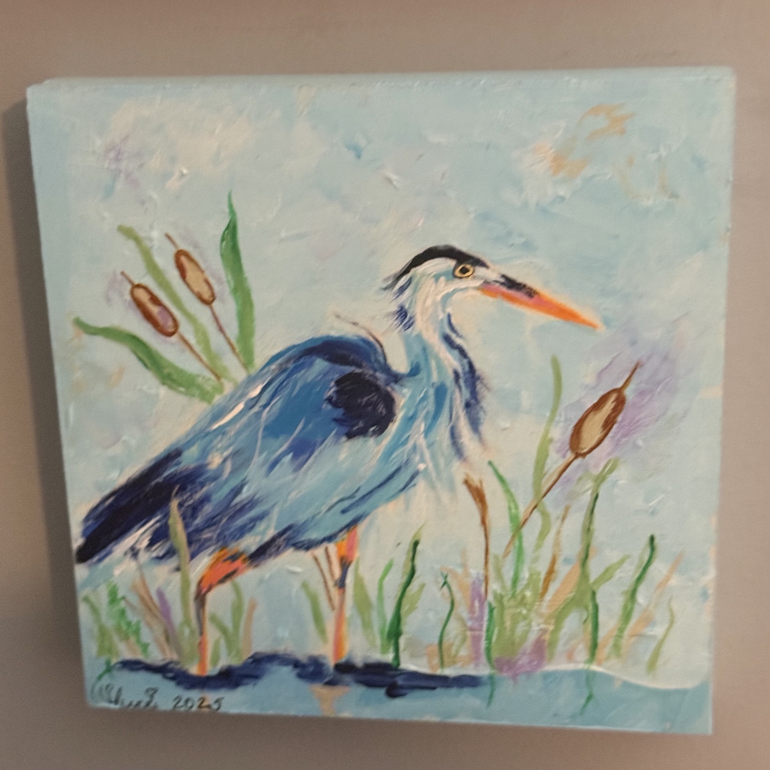 Painting of a blue heron among reeds