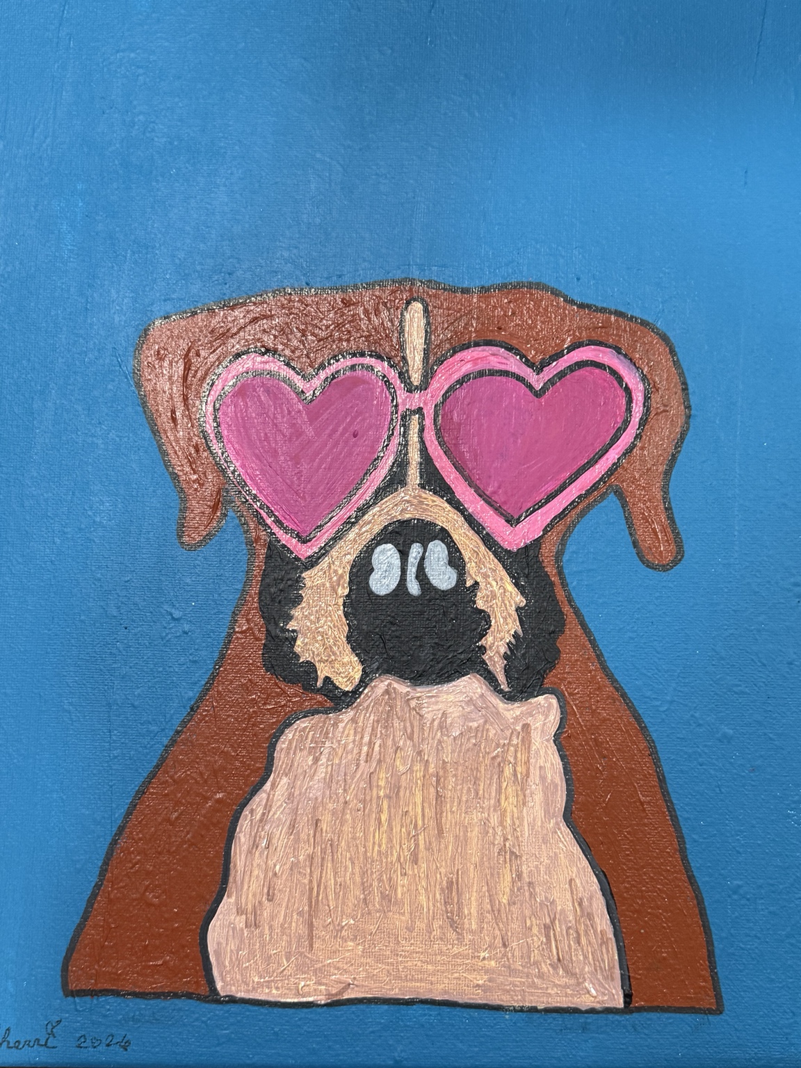 Dog wearing pink heart-shaped sunglasses