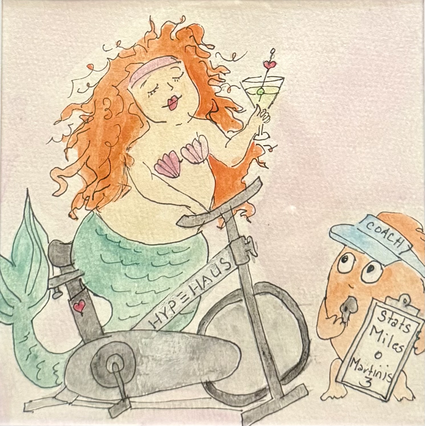 Mabel the mermaid riding an exercise bike with Nugget the fish