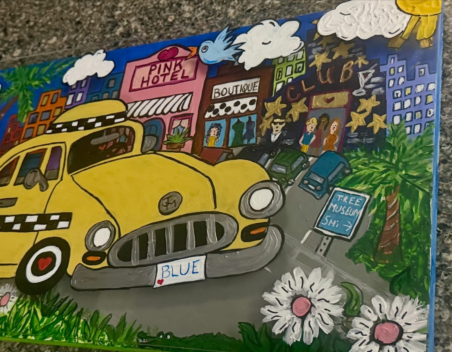 Layered painting of a large yellow taxi in a colorful city street