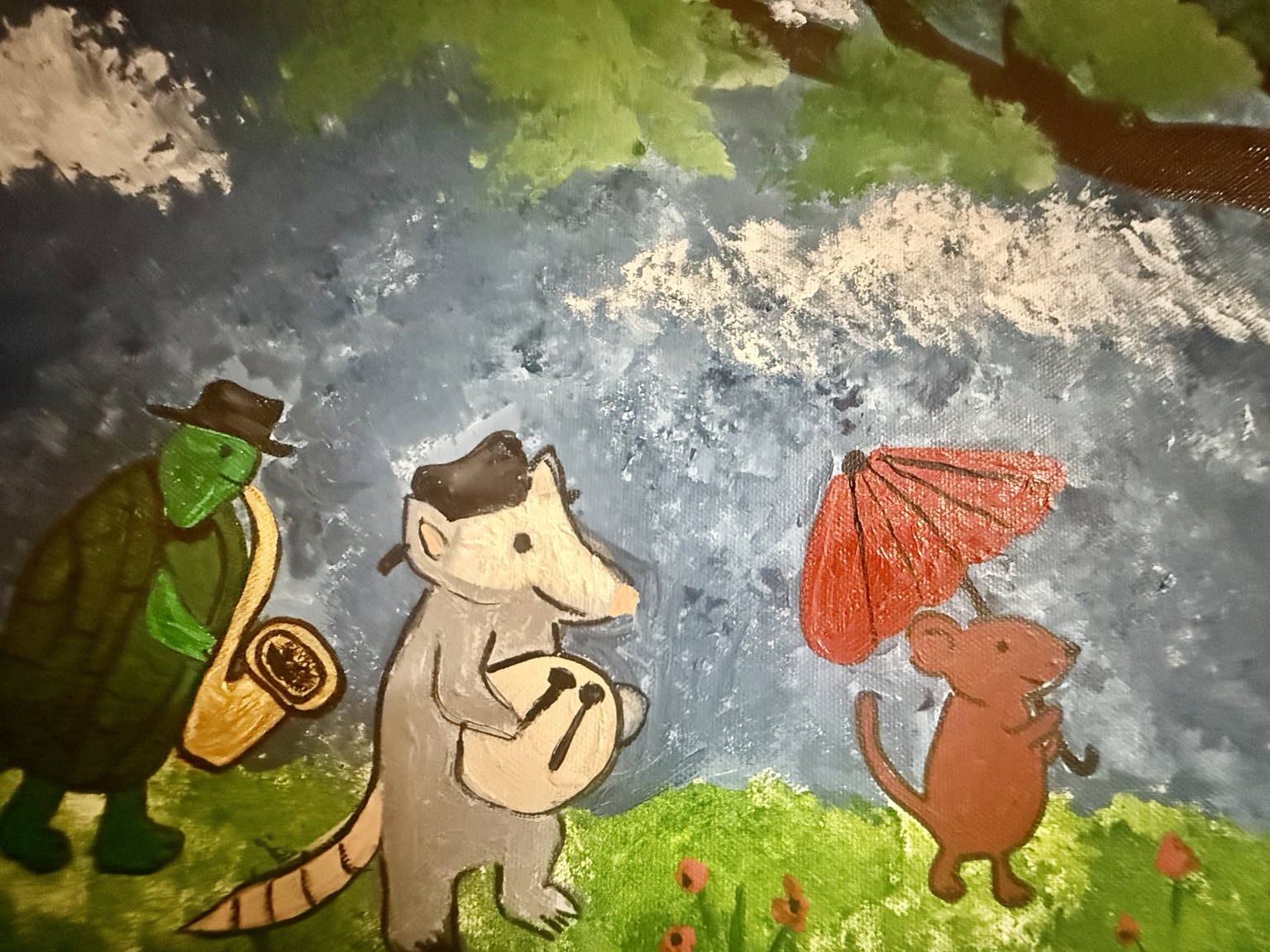 Opossum on drum and small mouse with a red parasol